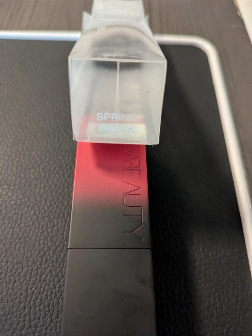 Huda Beauty Powder Bullet Matte Lipstick in Spring Break